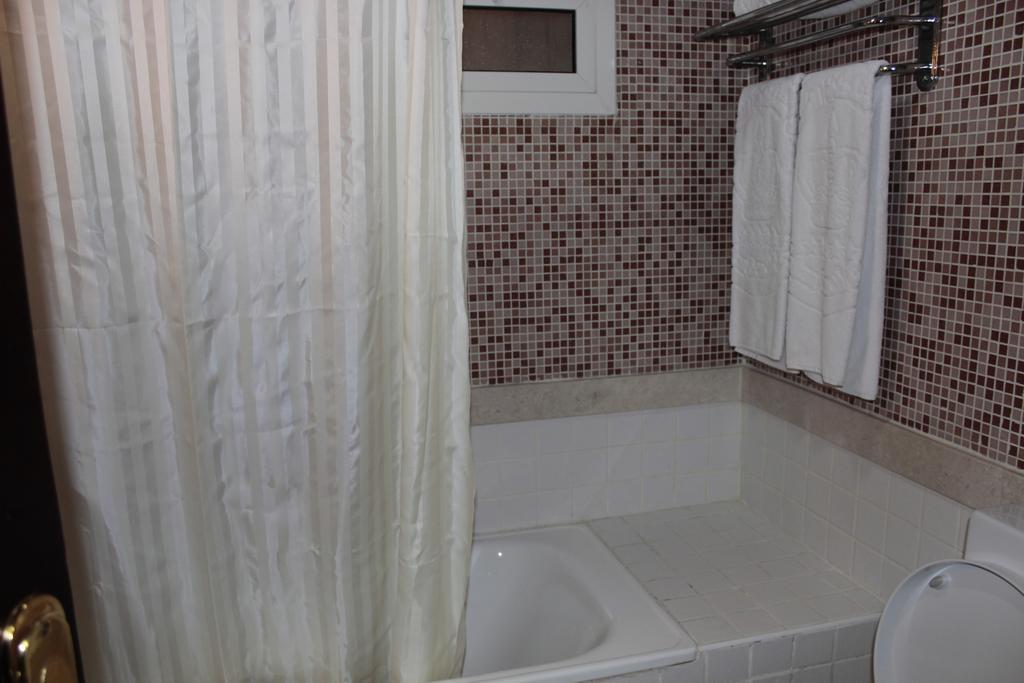 奥苏丹海滨度假酒店 阿尔科尔 外观 照片 A shower curtain
