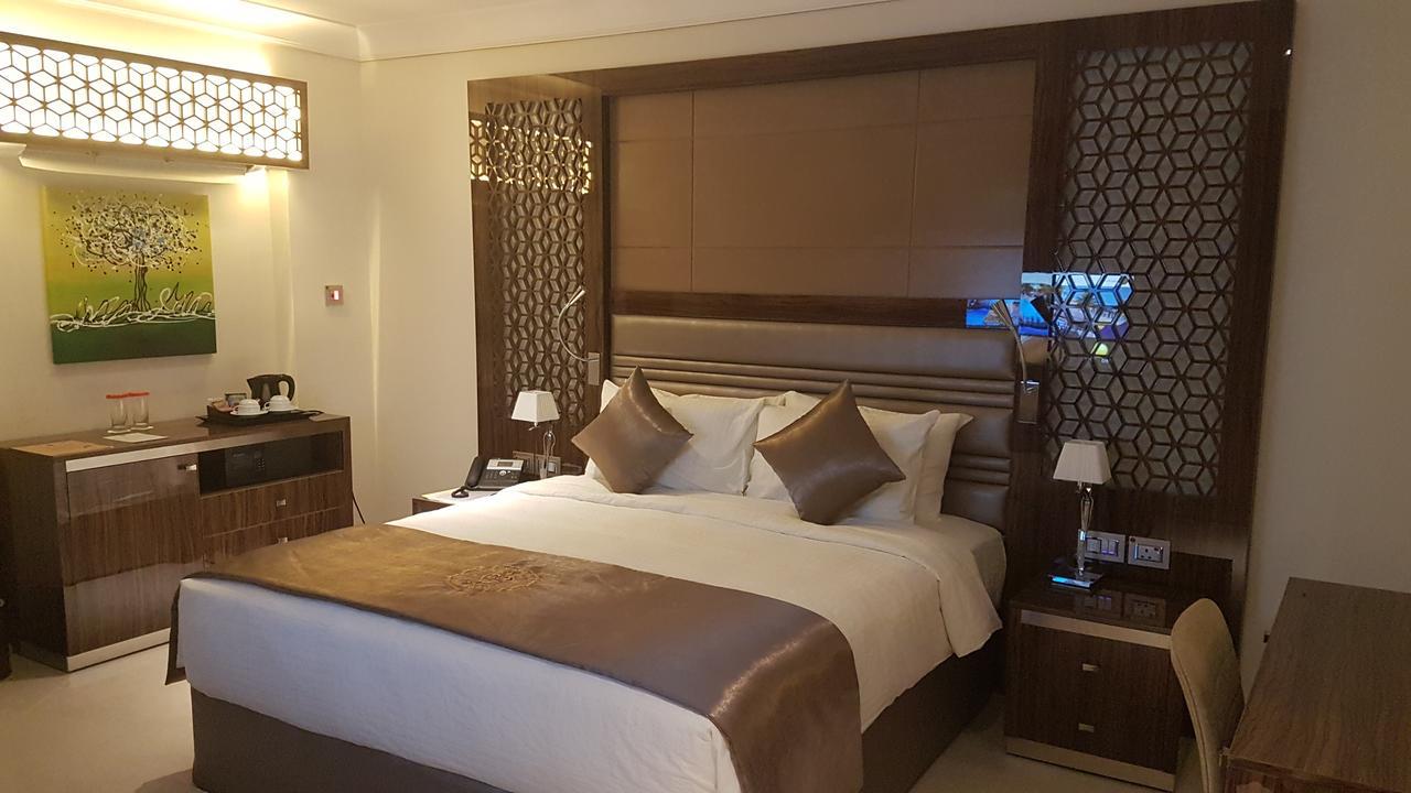 奥苏丹海滨度假酒店 阿尔科尔 外观 照片 A bedroom at the hotel